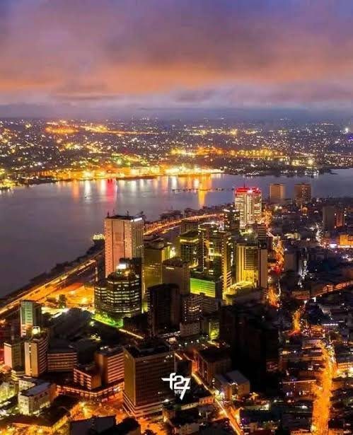 Lagos skyline and lagoon lit up at night